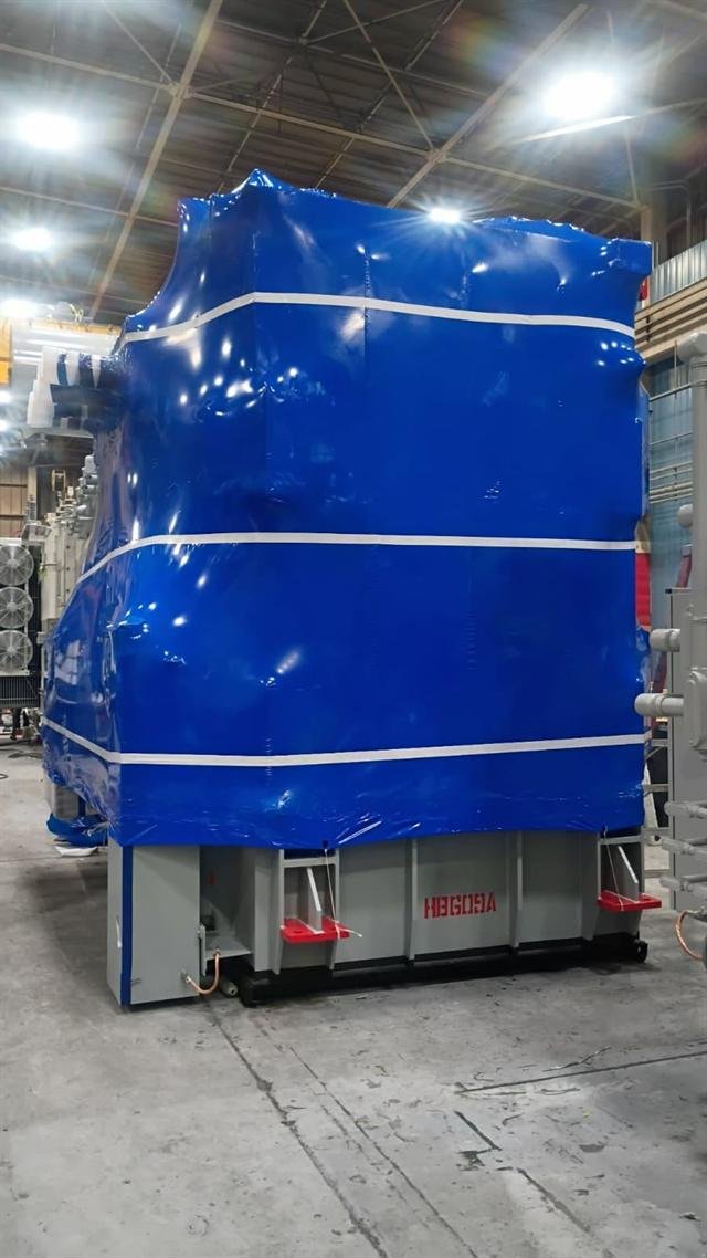 Large transformer preserved in shrink wrap for long-term outdoor storage